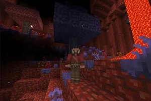 A character in a lava-lit voxel cave, from the official VoxeLibre repository screenshot